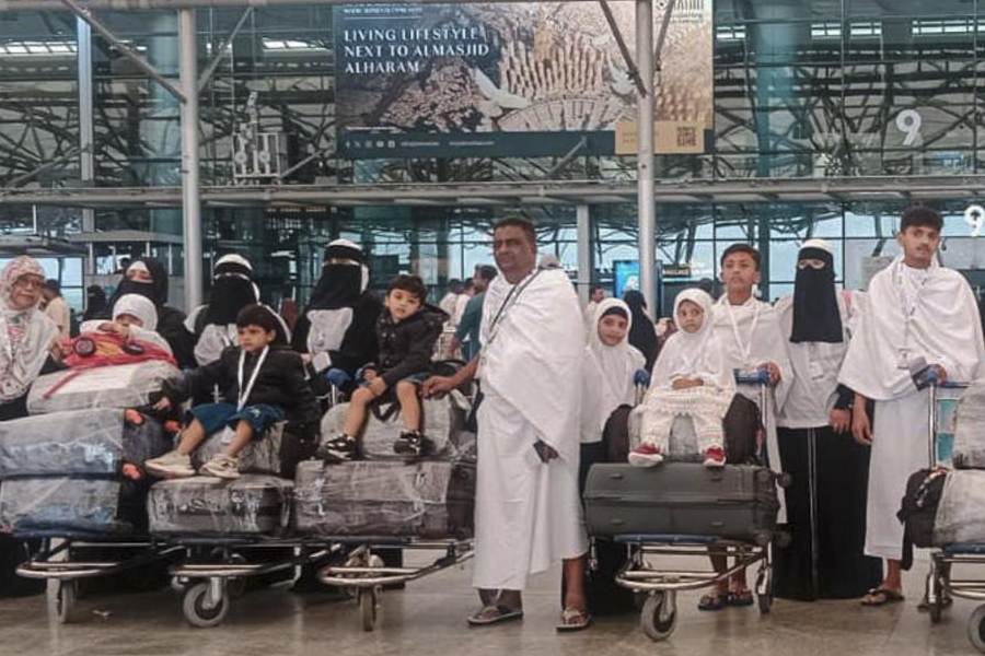 A handout photo shows Syed Naseeruddin and his family before their departure for Saudi Arabia, in Hyderabad, Monday, Nov. 17, 2025