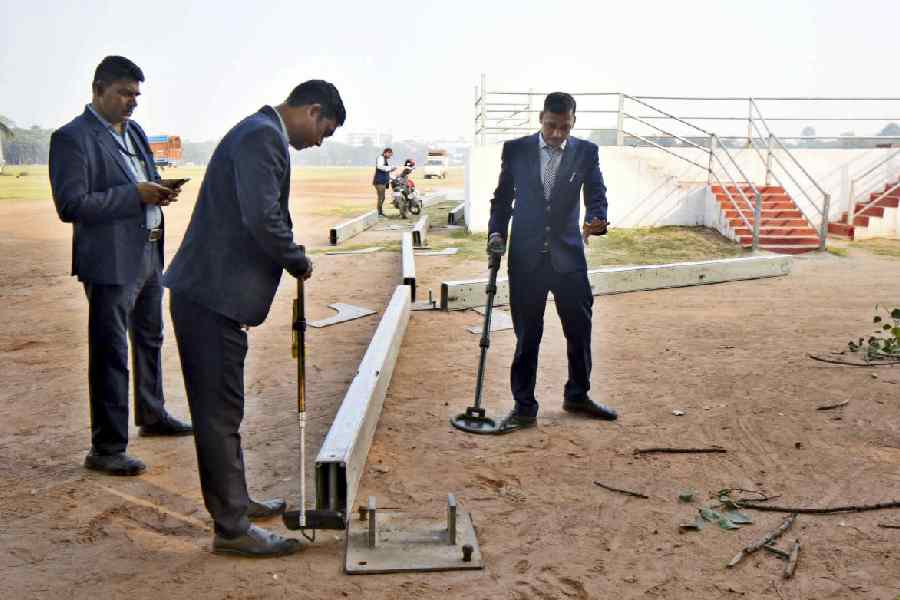 The bomb squad on Monday checks the Gandhi Maidan in Patna ahead of the swearing-in.