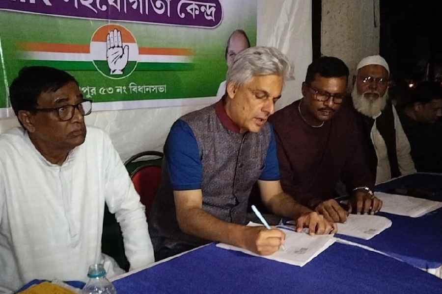 Isha Khan Choudhury, the Congress MP of Malda Dakshin, helps fill out forms for the SIR, in the Jalalpur area of Kaliachak 1 block, on Sunday.