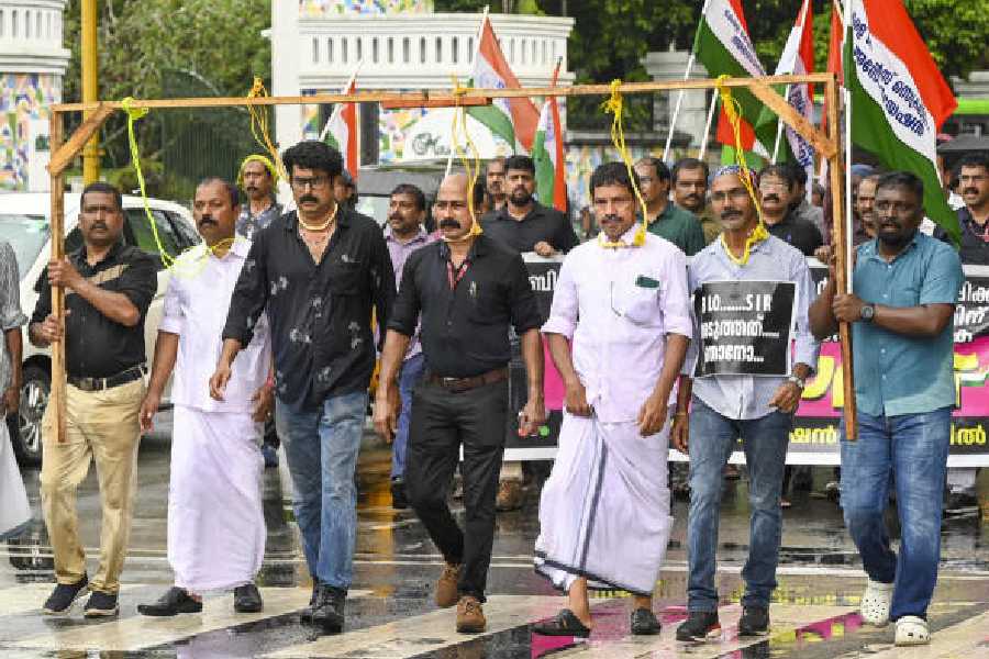 Government employees protest outside the Election Commission office in Thiruvananthapuram on Monday. 