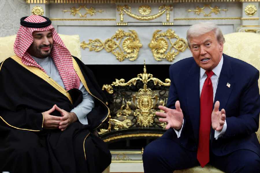 U.S. President Donald Trump speaks during a meeting with Saudi Crown Prince and Prime Minister Mohammed bin Salman in the Oval Office at the White House in Washington, D.C., U.S., November 18, 2025.