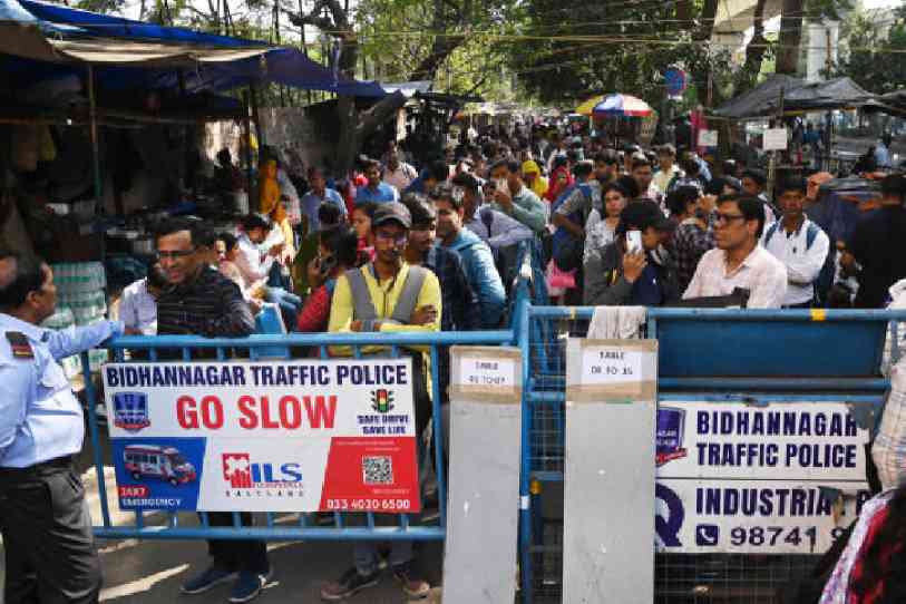 Primary school teacher job aspirants wait outside the office of the primary education board in Salt Lake on Tuesday. The candidates had queries that they wanted officials to resolve, sources said. Picture by Bishwarup Dutta