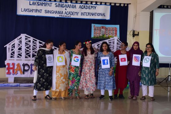 A humorous fashion show by male teachers delighted students, followed by an enriching Nehru-themed quiz by Director Ms. Meena Kak. Students received car stickers as souvenirs, making the celebration both educational and joyful.