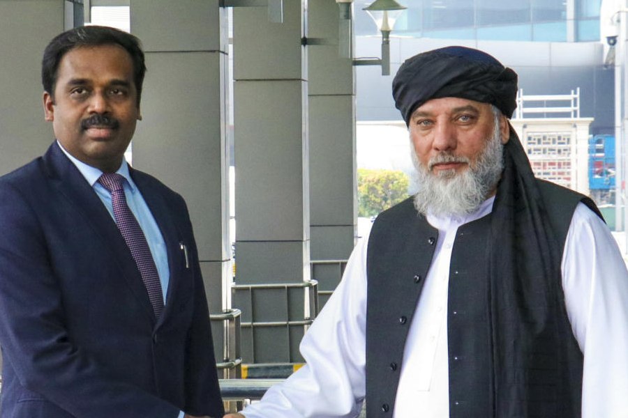 In this image posted on Nov. 19, 2025, Afghan Industry and Commerce Minister Alhaj Nooruddin Azizi being welcomed upon his arrival for an official visit to India.