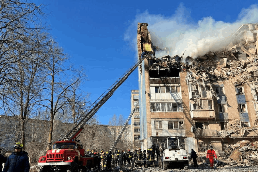 Rescuers work at the site of the apartment building hit by a morning Russian missile strike, amid Russia's attack on Ukraine, in Ternopil, Ukraine in this handout picture released November 19, 2025.