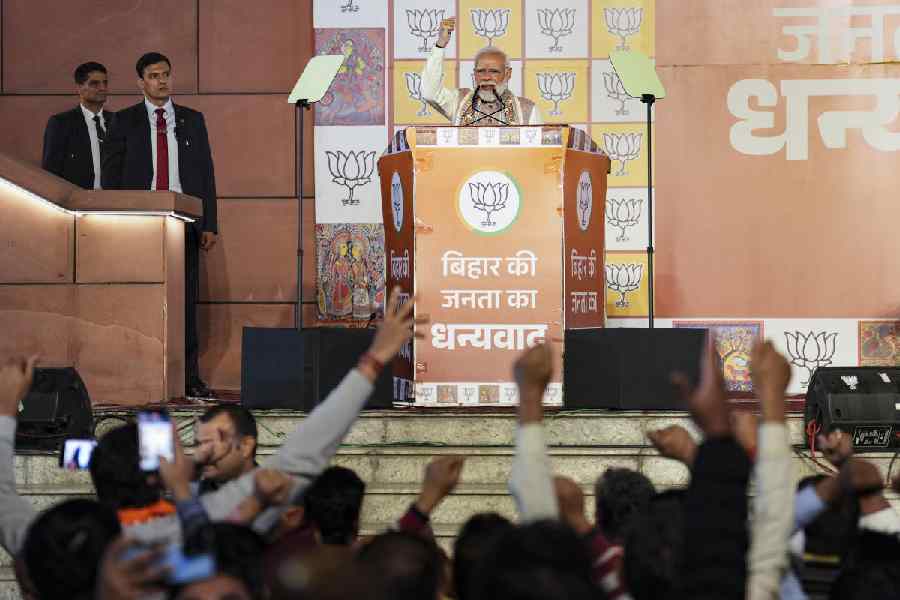Prime Minister Narendra Modi addresses the gathering during the celebration of NDA's victory in the Bihar Assembly elections, at BJP headquarters, in New Delhi, Friday, Nov. 14, 2025.
