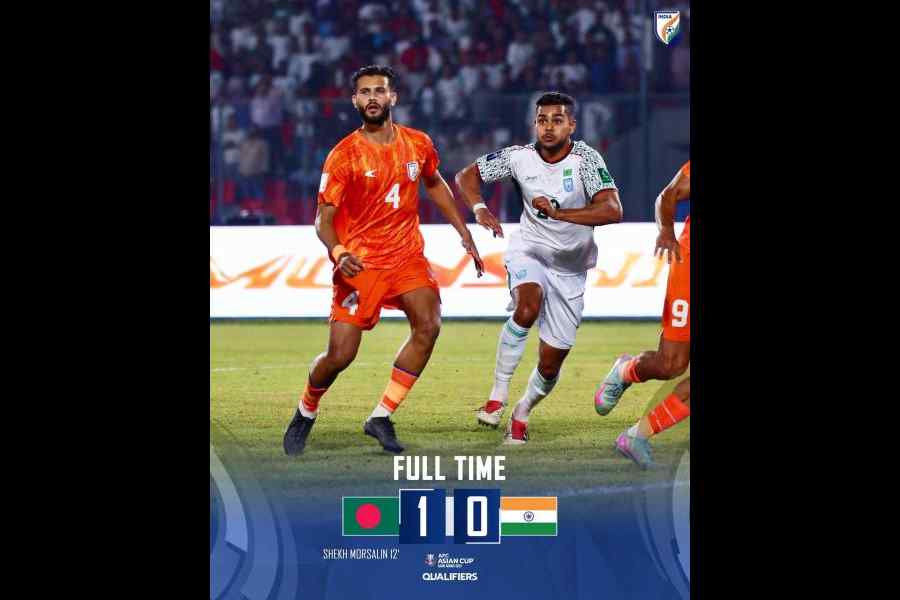 Anwar Ali (left) of India and a Bangladesh player in action during Tuesday's AFC Asian Cup qualifying match in Dhaka. India lost 1-0, their first defeat against Bangladesh in 22 years. With club football in limbo, the national team's performance has also had an adverse impact