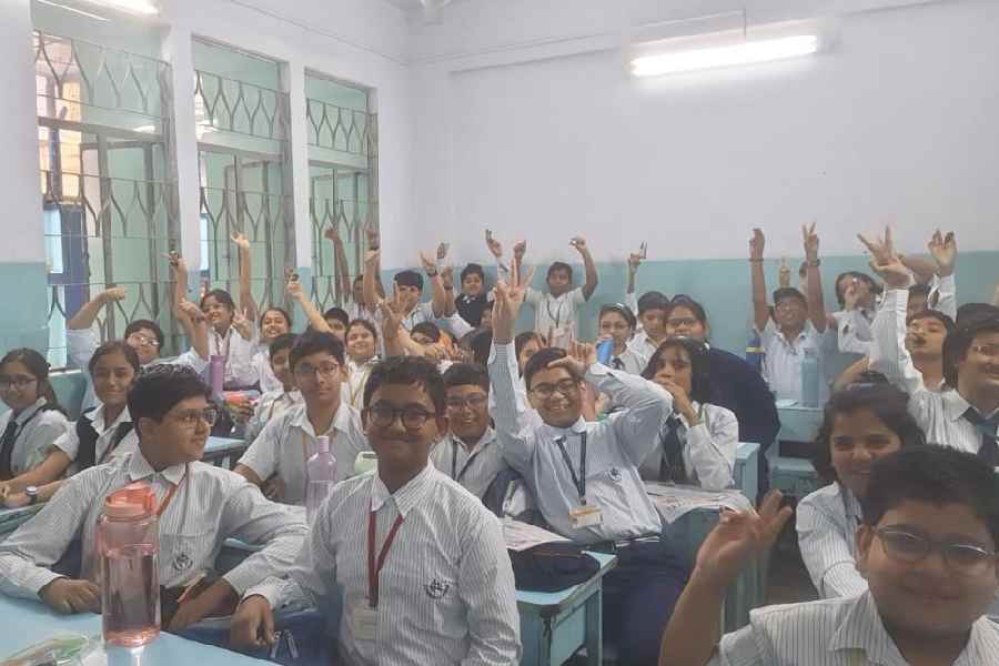Class VI students of South Point High School enjoy their millet bar