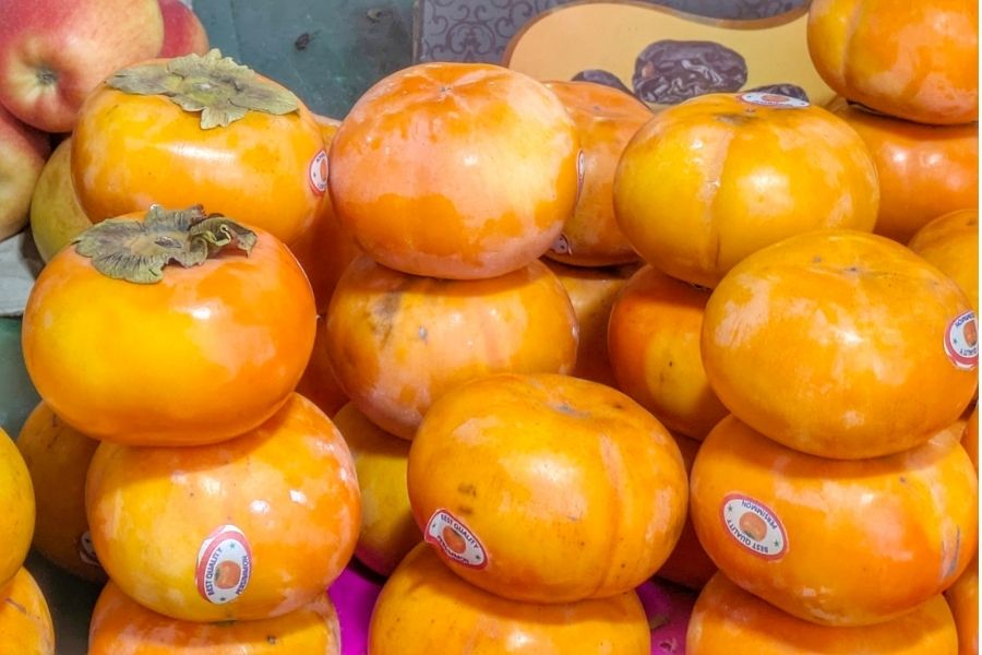 The fruit was once imported mainly from Japan, but is now grown in Himachal Pradesh and Kashmir, increasing its availability