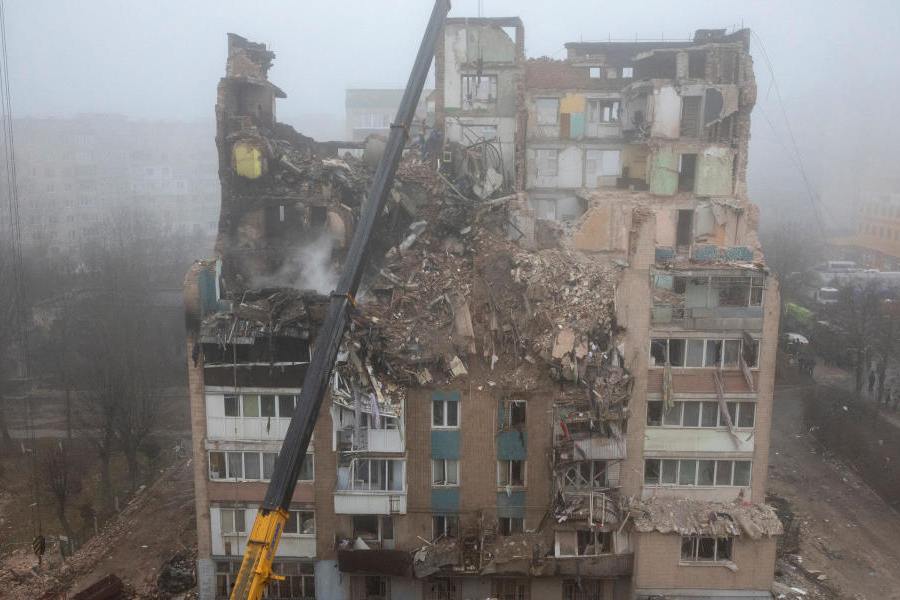 Rescuers clear debris at the site of an apartment building that was hit yesterday by a Russian missile, amid Russia's attack on Ukraine, in Ternopil, Ukraine, November 20, 2025.