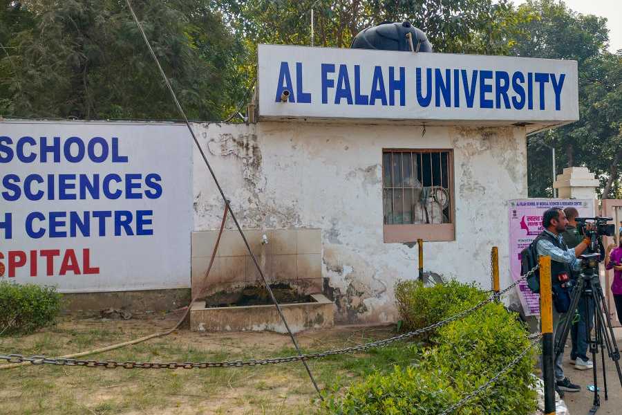 Media persons outside the Al Falah School of Medical Sciences and Research Centre, in Faridabad, Haryana, Tuesday, Nov. 18, 2025.