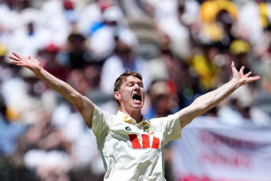 Australia's Brendan Doggett appeals unsuccessfully for the LBW wicket of England's Ollie Pope