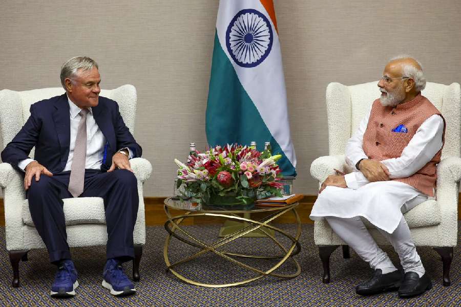 In this image posted on Nov. 21, 2025, Prime Minister Narendra Modi with Naspers Chairman Koos Bekker during a meeting, in Johannesburg, South Africa.
