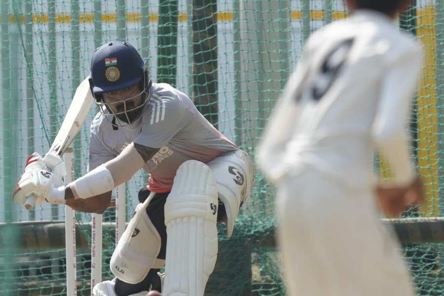 KL Rahul attempts a sweep during practice in Guwahati on Friday.
