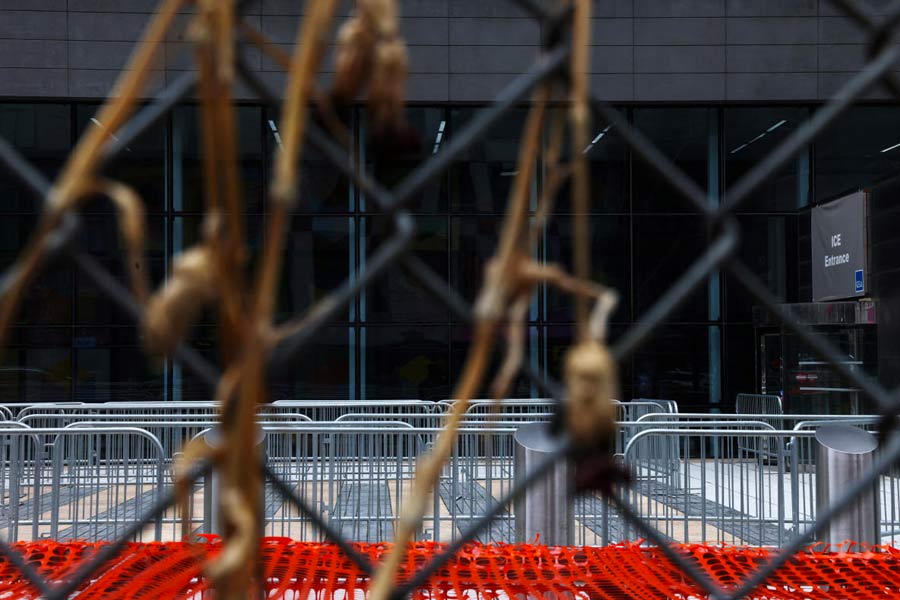 The entrance to the U.S. Immigration and Customs Enforcement (ICE) office stands behind fences outside 26 Federal Plaza in New York City, U.S., November 21, 2025.