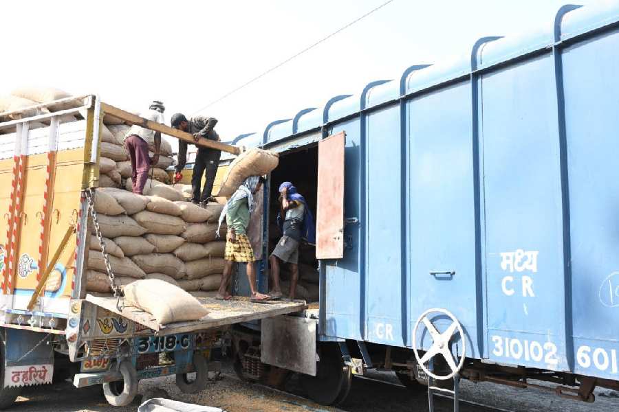 Goods being loaded onto a train.