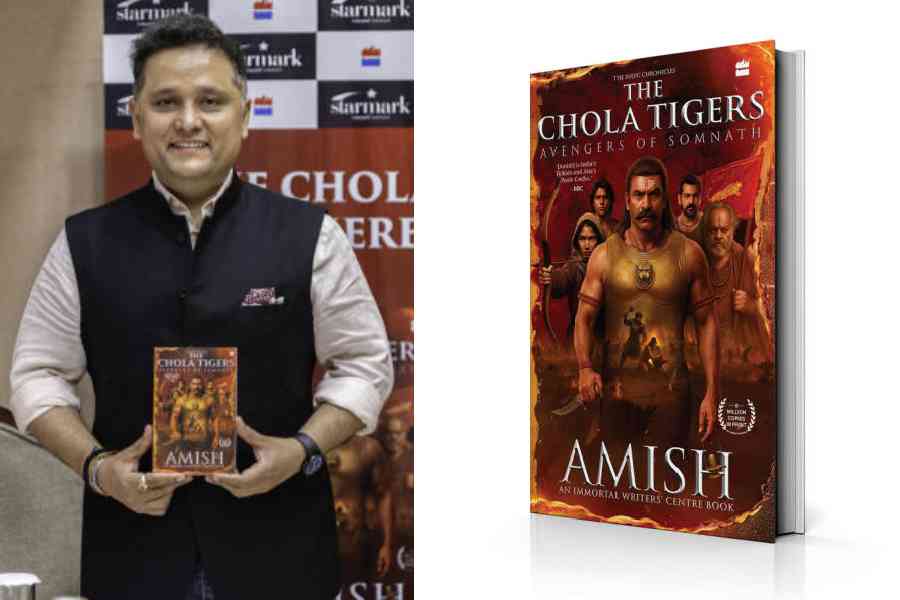 Amish with a copy of The Chola Tigers: Avengers of Somnath at Taj Bengal on November 10