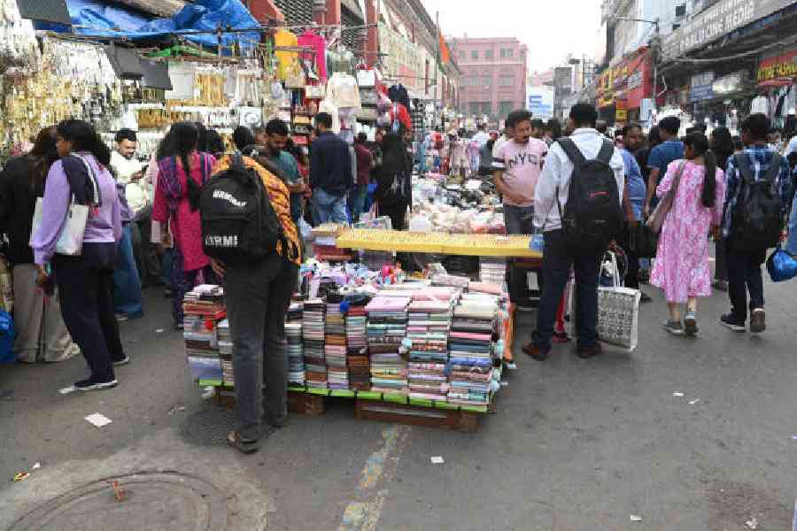 Hawkers occupy a portion of Bertram Street in the New Market area on Sunday. Pictures by Sanat Kr Sinha