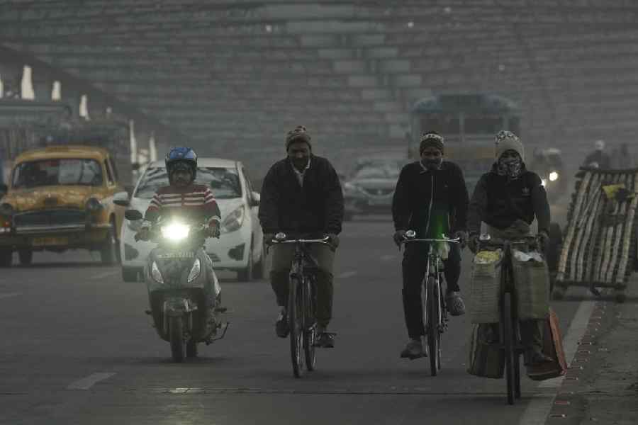 Slow traffic on the Howrah bridge during the cold winter morning in Kolkata.