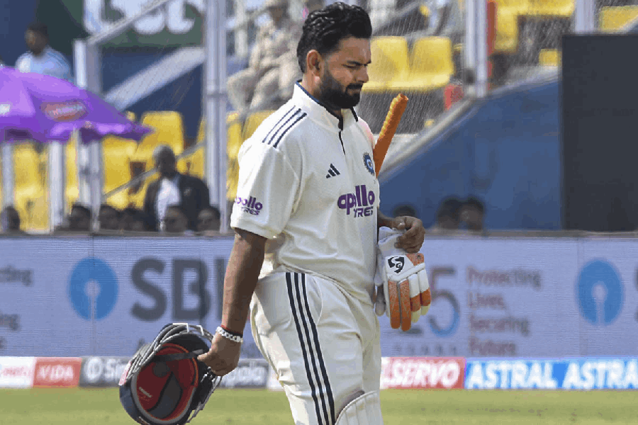 India's captain Rishabh Pant walks after his dismissal during day three of the second Test cricket match between India and South Africa, at ACA Stadium in Guwahati, Monday, Nov. 24, 2025.