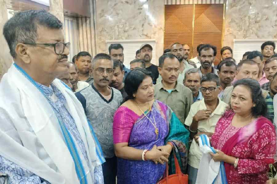 Rabindranath Ghosh, the chairman of the Cooch Behar municipality, at the felicitation organised by casual workers on Monday. Picture by Main Uddin Chisti