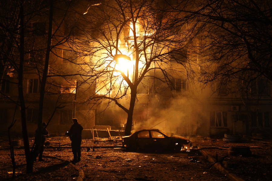 A residential building burns after a Russian attack on Zaporizhzhia, Ukraine, Wednesday, Nov. 26, 2025.