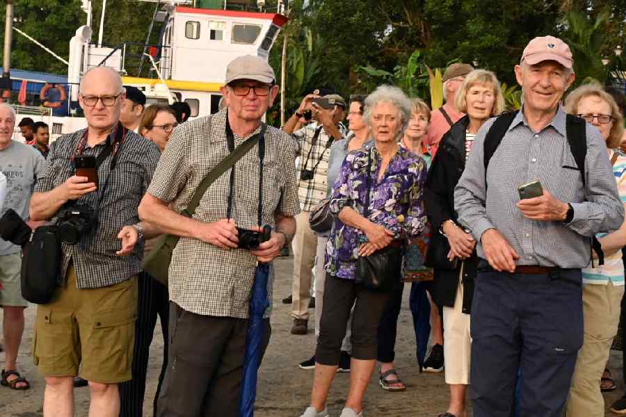 Foreign tourists at Babughat in Calcutta.