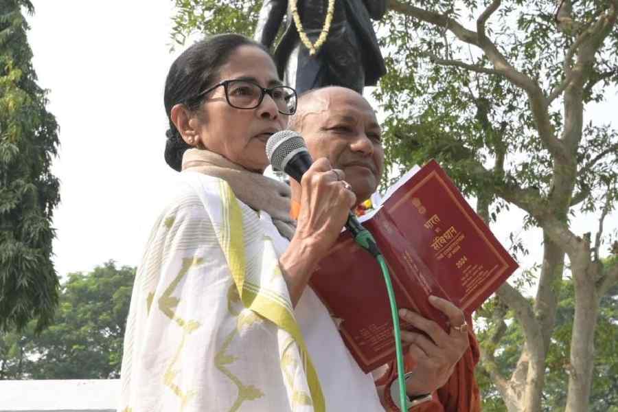Chief minister Mamata Banerjee, standing by BR Ambedkar’s statue on Red Road on Wednesday, holds a copy of the Constitution. She read out the Preamble as a 'positive reminder to defend the democratic rights of the people'