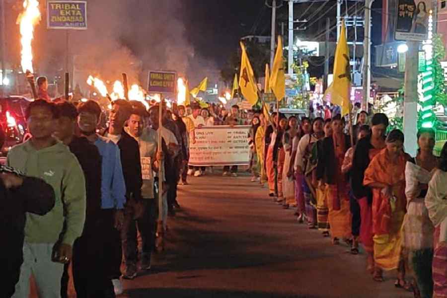Tribal organisations take out a torchlight rally in Kokrajhar, Assam, on Thursday