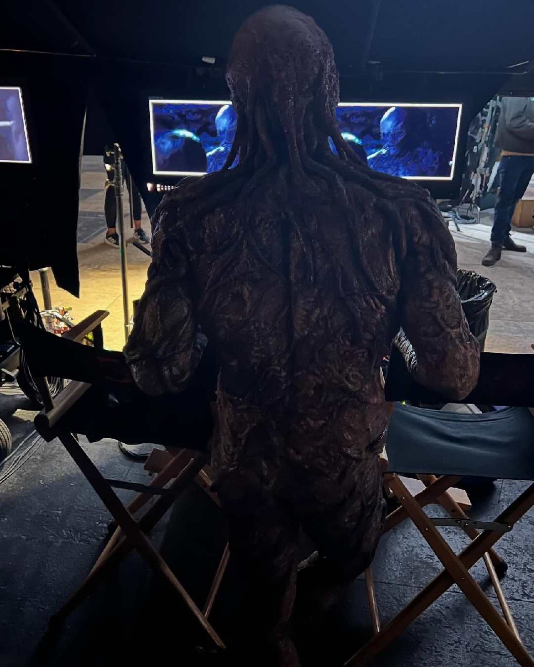 Jamie Campbell Bower reviews his shots as Vecna