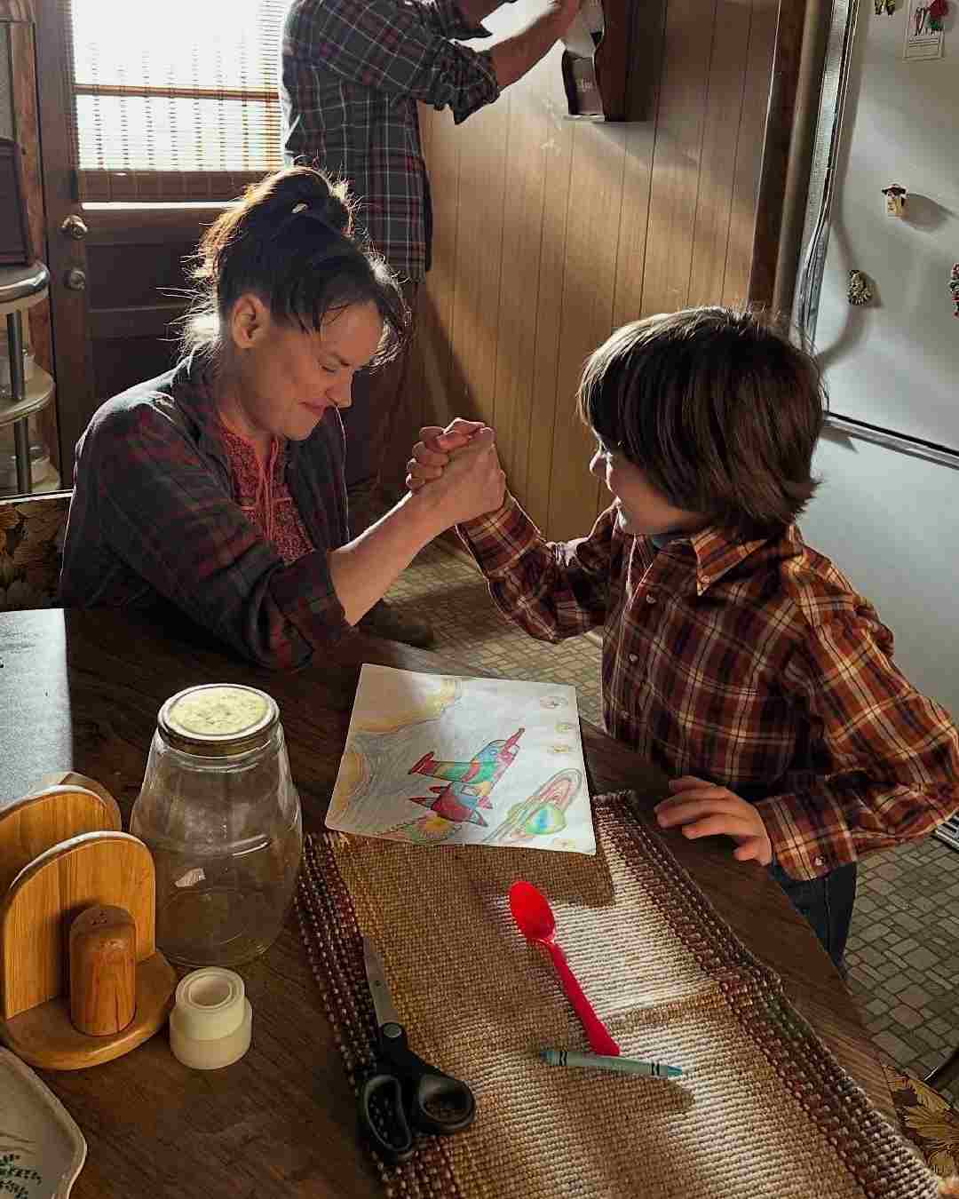 Winona Ryder arm wrestles Luke Kokotek, who plays the younger version of Noah Schnapp’s Will Byers in the latest instalment of Stranger Things.