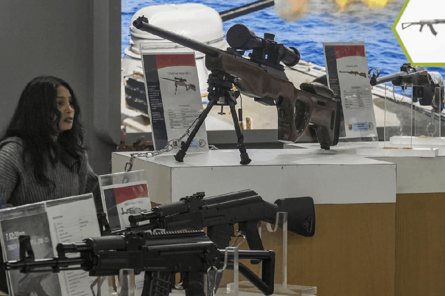 Arms are displayed at a stall at the Defence pavilion during the 44th India International Trade Fair (IITF), at Bharat Mandapam, in New Delhi, Sunday, Nov. 23, 2025.
