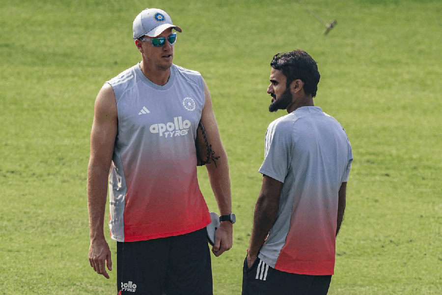 India's Akash Deep and bowling coach Morne Morkel during a training session ahead of the first Test cricket match between India and South Africa, at Eden Gardens in Kolkata, Wednesday, Nov. 12, 2025.