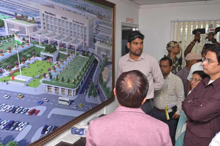 Darjeeling MP Raju Bista (right) reviews the redevelopment plan of the New Jalpaiguri railway station in Siliguri on Friday. 