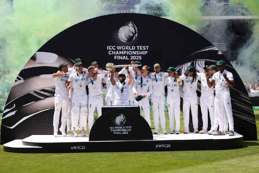 Temba Bavuma of South Africa celebrates with the trophy after winning the final during day 4 of the ICC World Test Championship, final match between South Africa and Australia at Lords Cricket Ground.