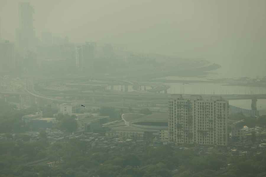 Buildings are shrouded in smog as air pollution persists in Mumbai, India, November 28, 2025.