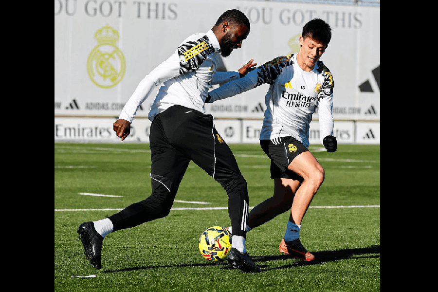 Real Madrid's Antonio Rudiger in action with Arda Guler before their game against Girona.