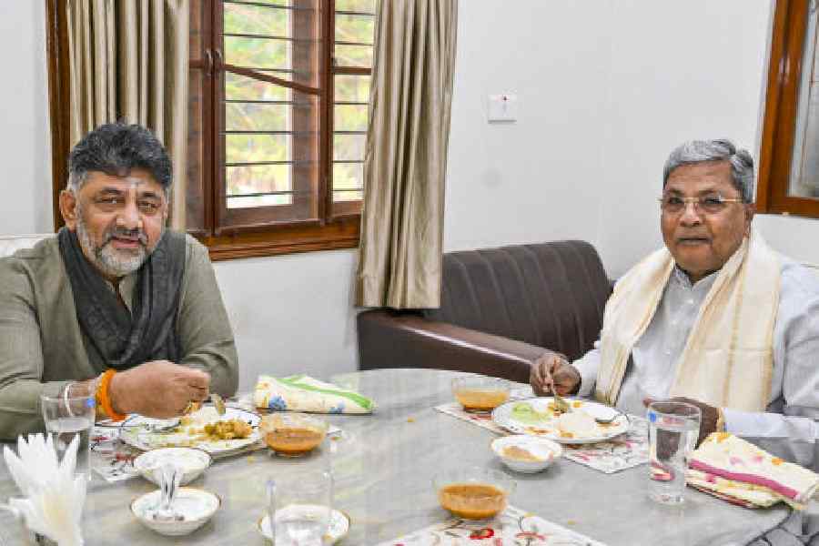 Siddaramaiah (right) with DK Shivakumar during the breakfast meet on Saturday.