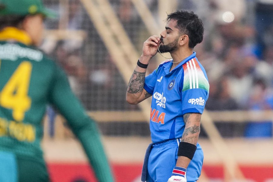 India's Virat Kohli celebrates his century during the first ODI cricket match of a series between India and South Africa, at JSCA International Stadium Complex, in Ranchi, Jharkhand, Sunday, Nov. 30, 2025.