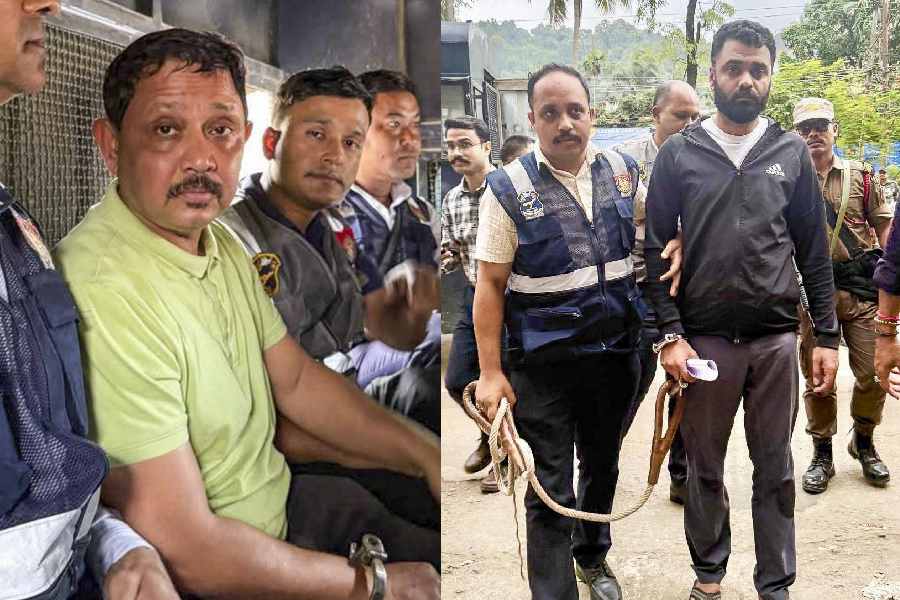 Shyamkanu Mahanta (left) and Siddharth Sharma after their arrest on Wednesday.