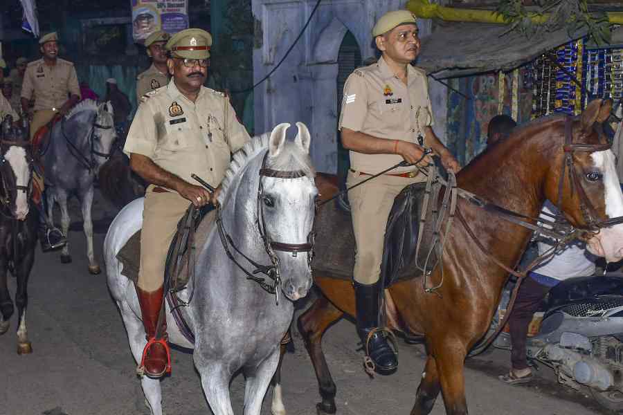 Police personnel during a flag march on the eve of the ‘Dussehra’ festival, in Bareilly, Uttar Pradesh