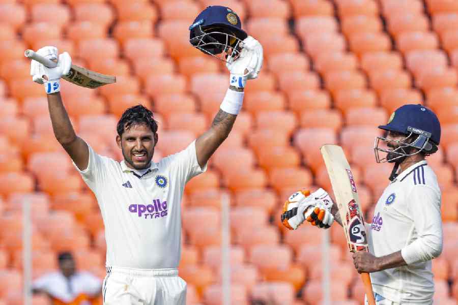 India’s Dhruv Jurel, left, celebrates his century with Ravindra Jadeja on day two of the first test cricket match between India and West Indies, at the Narendra Modi Stadium, in Ahmedabad