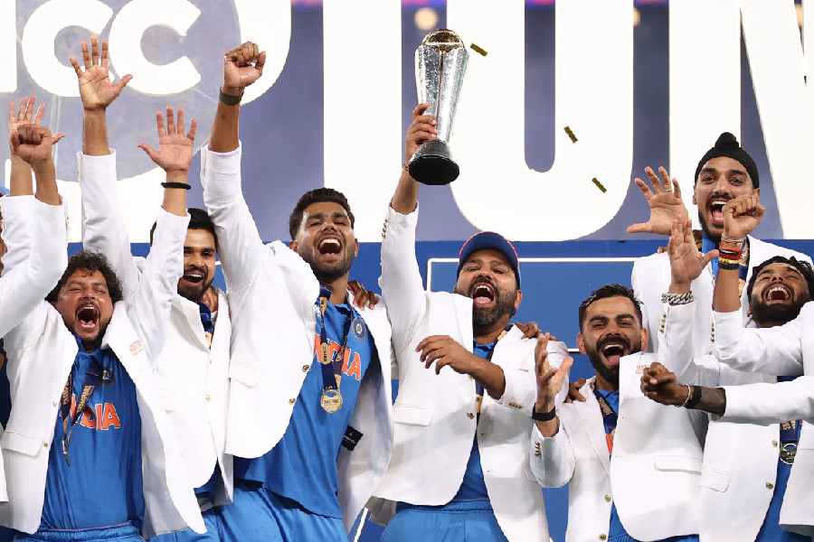 Rohit Sharma and (right) Virat Kohli after the Champions Trophy triumph in March.