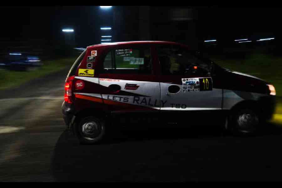 The Ladies category team of Nilasha Das and Ipsita Das take on the hazards of night rallying