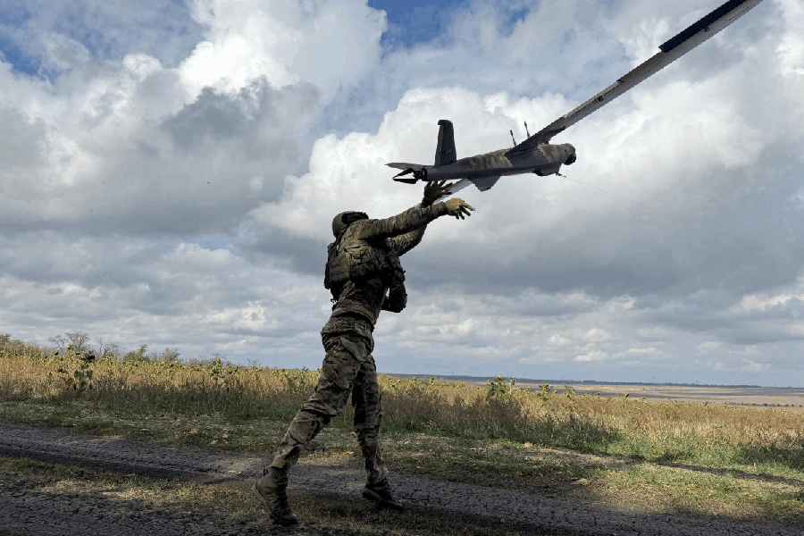 A serviceman of the 59th Separate Assault Brigade of Unmanned Systems named after Yakov Handziuk of the Armed Forces of Ukraine, launches a reconnaissance drone, amid Russia's attack on Ukraine, near the frontline town of Pokrovsk in Donetsk region, Ukraine October 6, 2025.