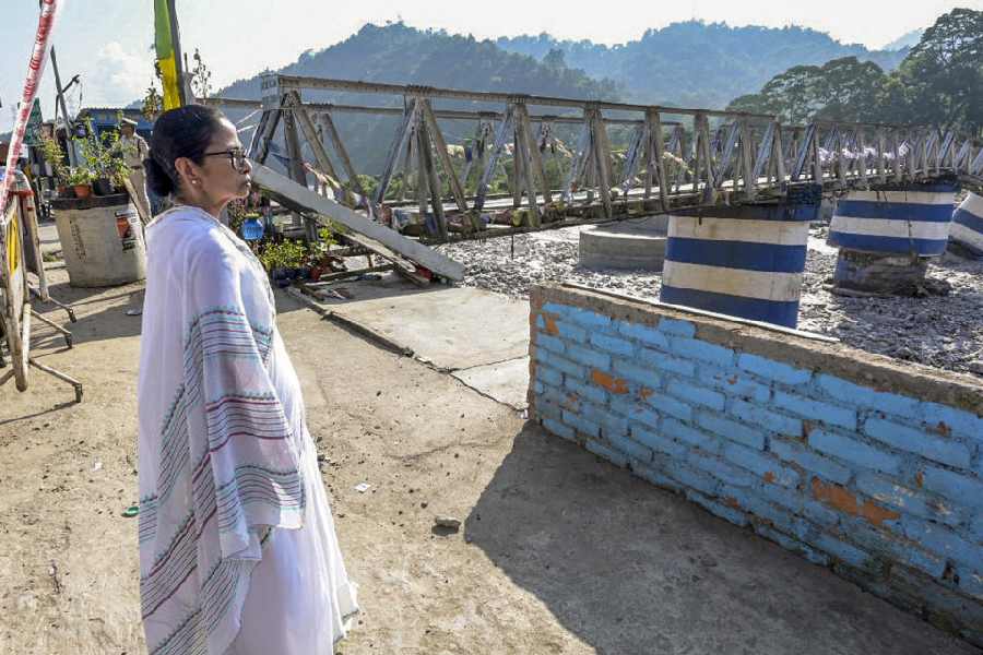 Mamata Banerjee visits a disaster-hit village after last week's devastating landslides and floods, at Dudhia village, in Darjeeling district