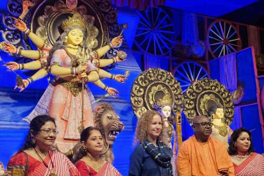 Before: Russian vice-consul Ektarina Tyurina on stage in GD Block with Swami Saradatmananda of Ramakrishna Mission Alambazar Math and some women of the block