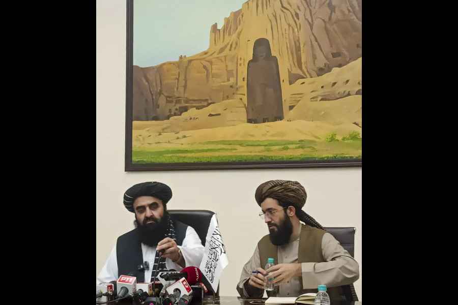 Minister of Foreign Affairs of Afghanistan Amir Khan Muttaqi addresses a press conference, in New Delhi, Friday, Oct. 10, 2025.