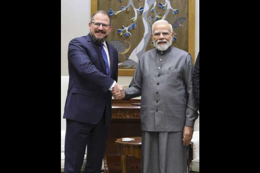 Prime Minister Narendra Modi with Cristiano Amon in New Delhi on Friday.