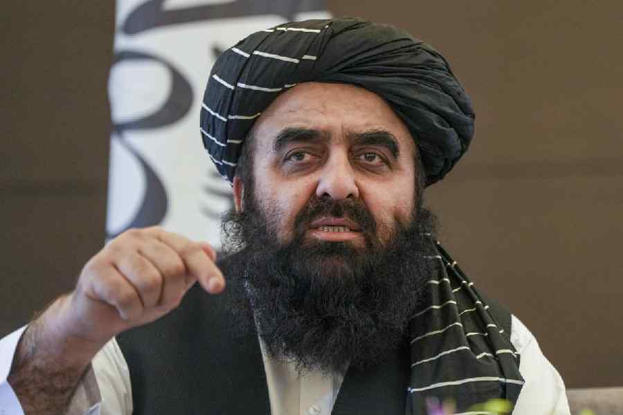 Afghanistan Foreign Minister Amir Khan Muttaqi addresses a press conference, in New Delhi, Sunday, Oct. 12, 2025.